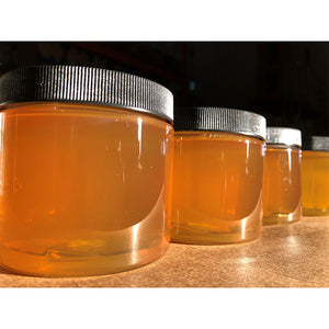 Brown Rice Syrup jars without labels golden color